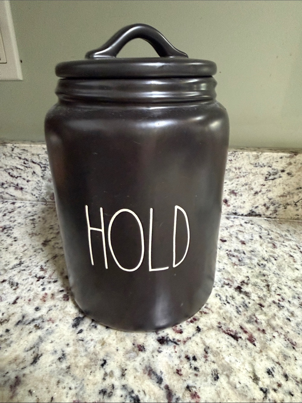 Rae Dunn Black Ceramic 'HOLD' Kitchen Canister with Lid